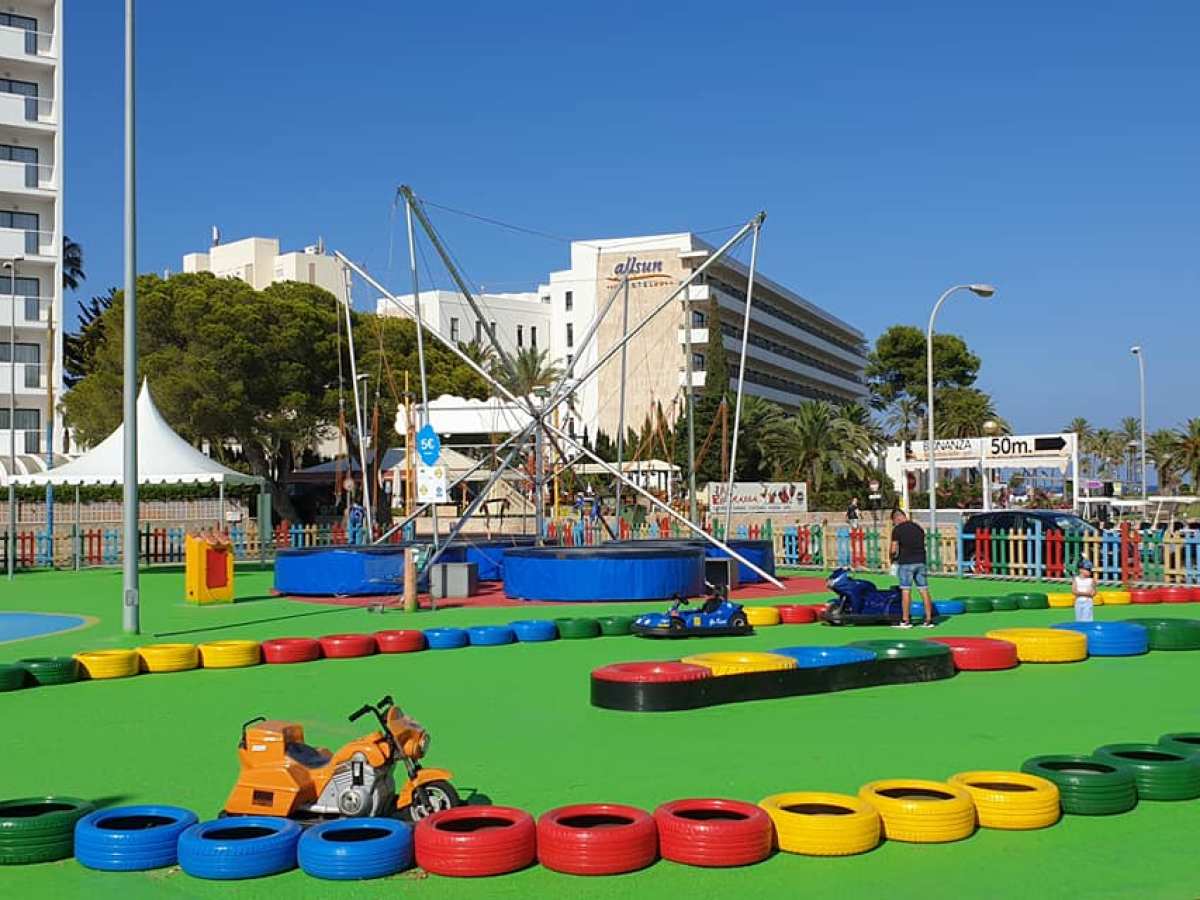 a colorful kite sitting on top of a building